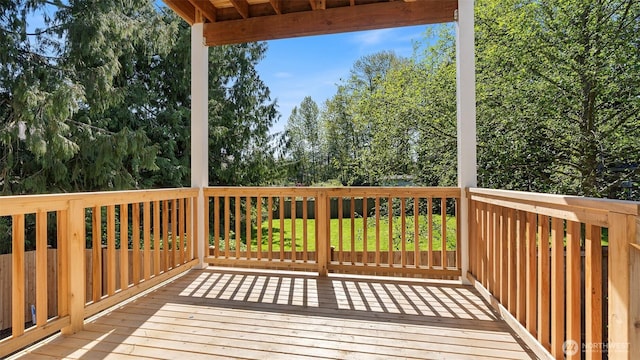 10811 Holly Dr Unit C, Everett, WA 98204 - wooden terrace with view of wooded area
