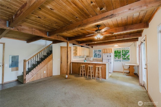 4662 SE Inwood Ln, Port Orchard, WA 98367 - kitchen with white appliances, electric panel, wood ceiling with exposed beams, a peninsula, and ceiling fan