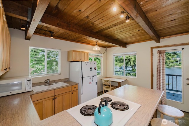 4662 SE Inwood Ln, Port Orchard, WA 98367 - kitchen featuring white appliances, a sink, wooden ceiling with exposed beams, wood finished floors, and a kitchen breakfast bar