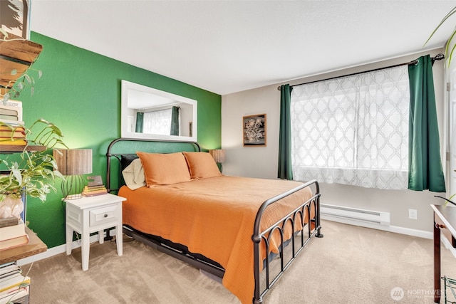4231 NE 5th St Unit E101, Renton, WA 98059 - carpeted bedroom with baseboard heating and baseboards