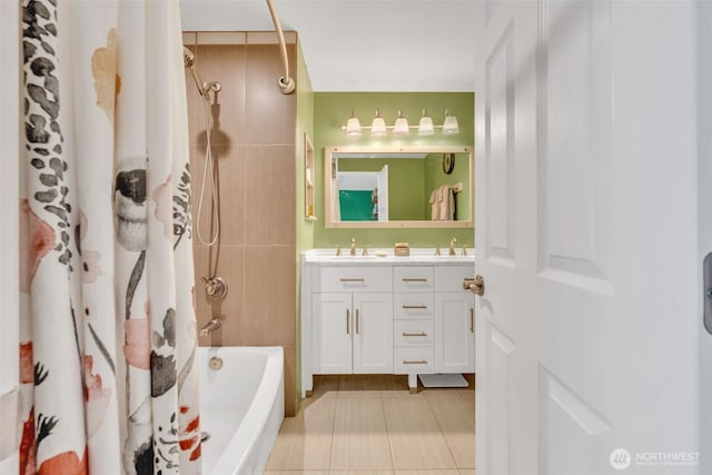 4231 NE 5th St Unit E101, Renton, WA 98059 - bathroom featuring double vanity, tile patterned flooring, and shower / bath combo with shower curtain