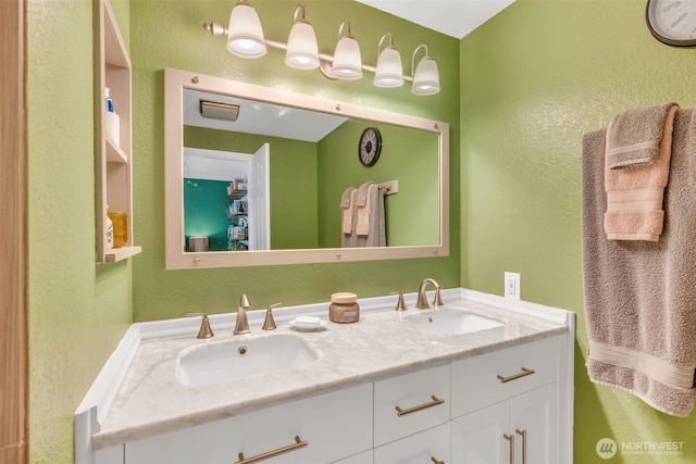 4231 NE 5th St Unit E101, Renton, WA 98059 - full bathroom with double vanity and a textured wall