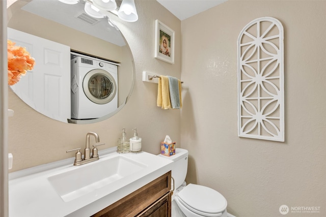 4231 NE 5th St Unit E101, Renton, WA 98059 - half bath featuring vanity and washer / dryer