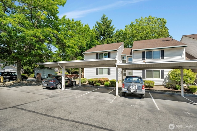 4231 NE 5th St Unit E101, Renton, WA 98059 - view of front of home with covered parking