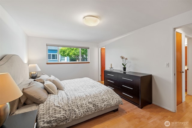 3435 34th Ave W, Seattle, WA 98199 - bedroom with light wood-type flooring and baseboards