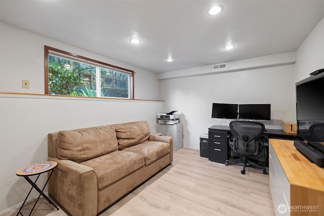 3435 34th Ave W, Seattle, WA 98199 - home office featuring light wood-type flooring and recessed lighting