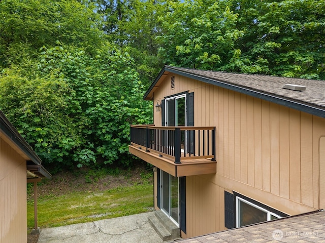 4562 SE Burley Olalla Rd, Olalla, WA 98359 - view of side of home featuring a balcony and roof with shingles