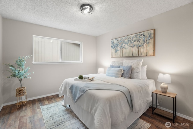 4562 SE Burley Olalla Rd, Olalla, WA 98359 - bedroom featuring wood finished floors, baseboards, and a textured ceiling