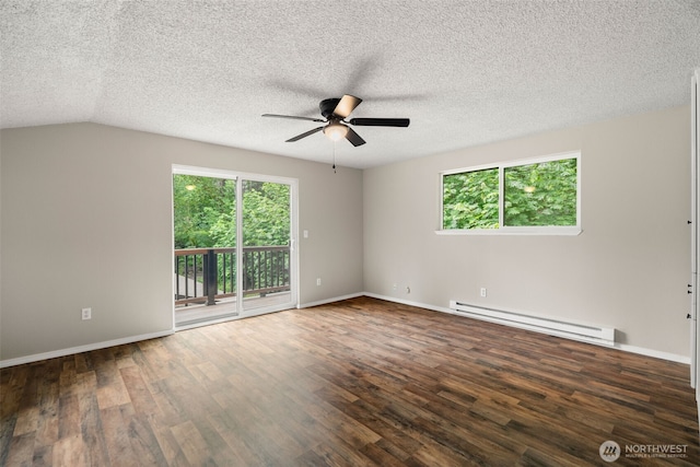 4562 SE Burley Olalla Rd, Olalla, WA 98359 - empty room featuring baseboard heating, a ceiling fan, healthy amount of natural light, wood finished floors, and a textured ceiling