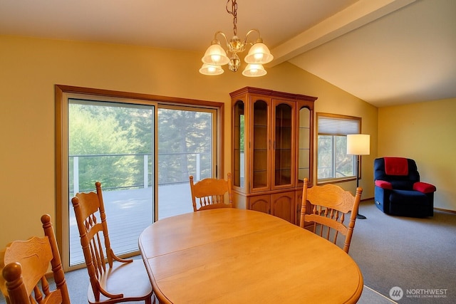 17147 Hope Island Ln, La Conner, WA 98257 - carpeted dining space featuring healthy amount of natural light and a chandelier