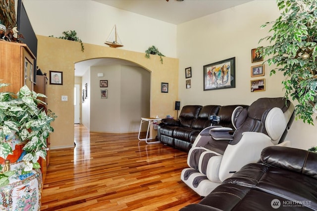 1440 Allyn Ln, Oak Harbor, WA 98277 - living room featuring arched walkways and light wood-type flooring