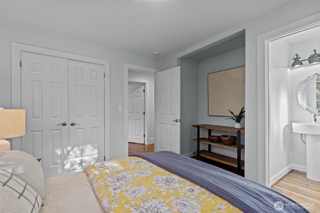 1716 N 125th St, Seattle, WA 98133 - bedroom with a closet and wood finished floors