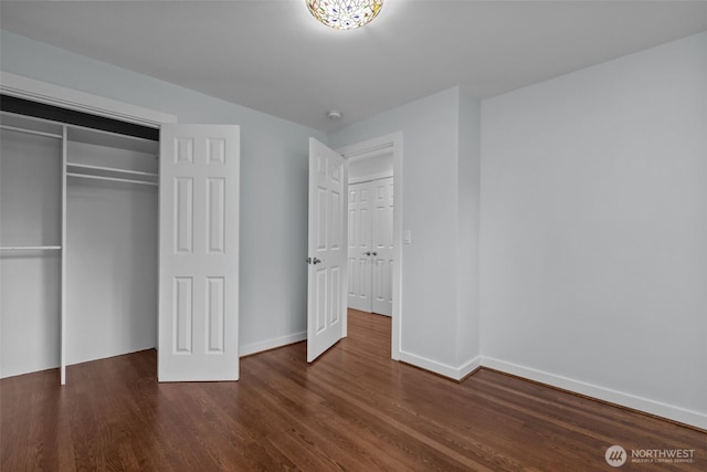 1716 N 125th St, Seattle, WA 98133 - unfurnished bedroom with wood finished floors and a closet