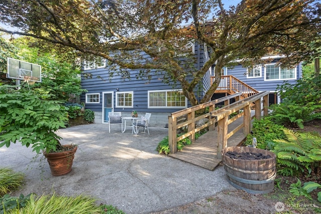 1716 N 125th St, Seattle, WA 98133 - rear view of house with a patio