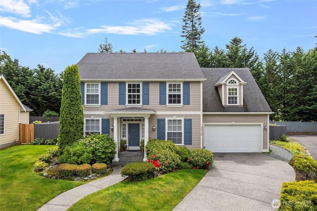 2315 35th Ct, Anacortes, WA 98221 - view of front facade with concrete driveway, a shingled roof, and an attached garage