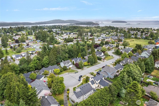 2315 35th Ct, Anacortes, WA 98221 - aerial view of property and surrounding area featuring nearby suburban area and a mountain backdrop