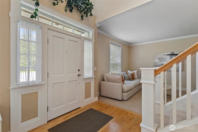 2315 35th Ct, Anacortes, WA 98221 - foyer featuring stairway, crown molding, healthy amount of natural light, and light wood finished floors