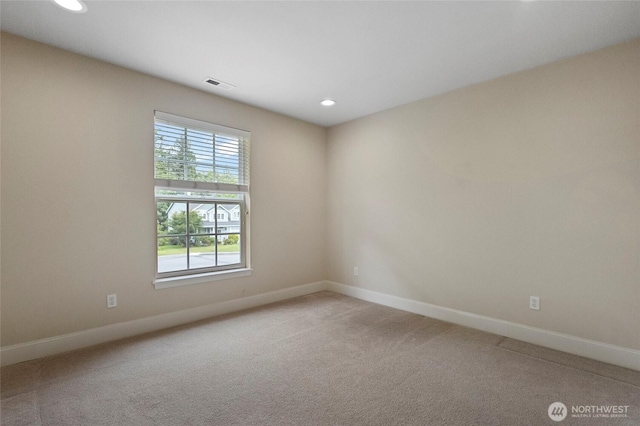 2315 35th Ct, Anacortes, WA 98221 - empty room featuring baseboards, recessed lighting, and light carpet