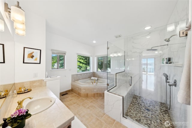 2364 Strawberry Point Rd, Oak Harbor, WA 98277 - full bath with vanity, a bath, a marble finish shower, and recessed lighting