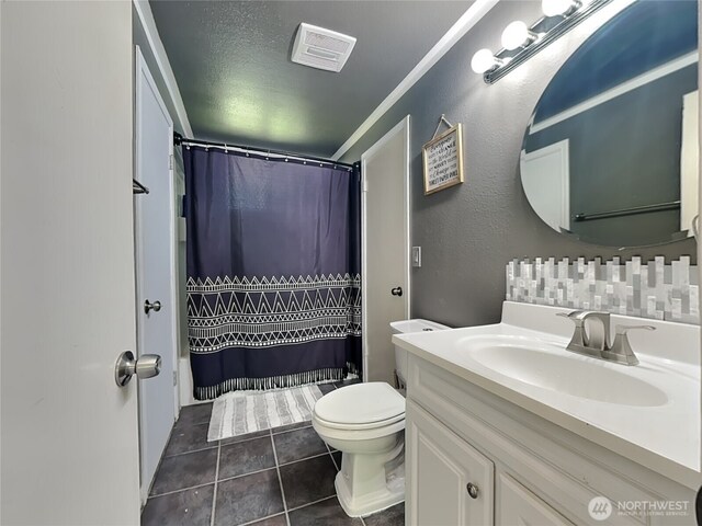 17103 15th Ave E, Spanaway, WA 98387 - full bathroom with toilet, vanity, tile patterned floors, and curtained shower