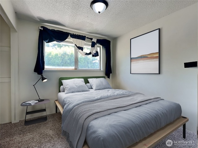 17103 15th Ave E, Spanaway, WA 98387 - carpeted bedroom with a textured ceiling