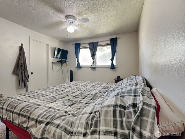 17103 15th Ave E, Spanaway, WA 98387 - bedroom featuring a textured ceiling and ceiling fan