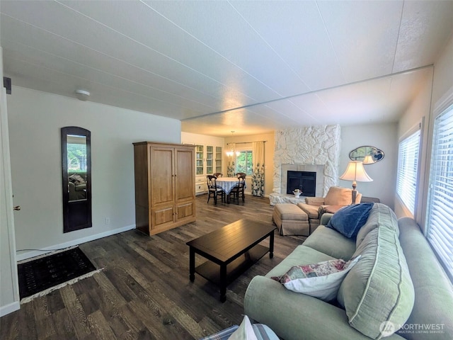 201 Union Ave SE Unit 188, Renton, WA 98059 - living area featuring dark wood finished floors, baseboards, and a stone fireplace