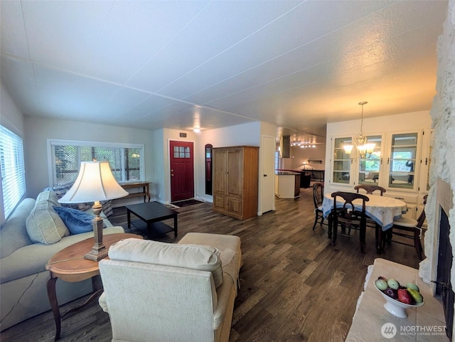 201 Union Ave SE Unit 188, Renton, WA 98059 - living room featuring dark wood-type flooring and a chandelier