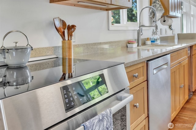 521 E Enchantment Dr, Union, WA 98592 - kitchen featuring stainless steel appliances, a sink, and light wood finished floors