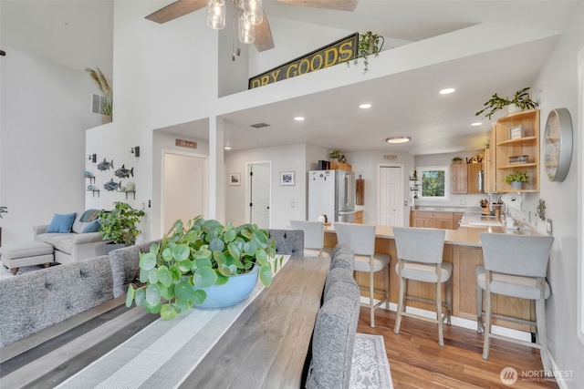 521 E Enchantment Dr, Union, WA 98592 - dining room with a ceiling fan, light wood-type flooring, recessed lighting, and a high ceiling