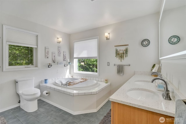 521 E Enchantment Dr, Union, WA 98592 - full bathroom featuring plenty of natural light, a garden tub, double vanity, and toilet