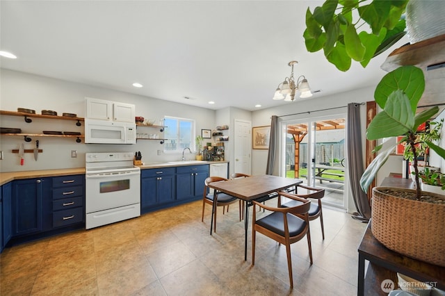 252 NW Ruby Ln, College Place, WA 99324 - kitchen with white appliances, blue cabinets, open shelves, a chandelier, and light countertops