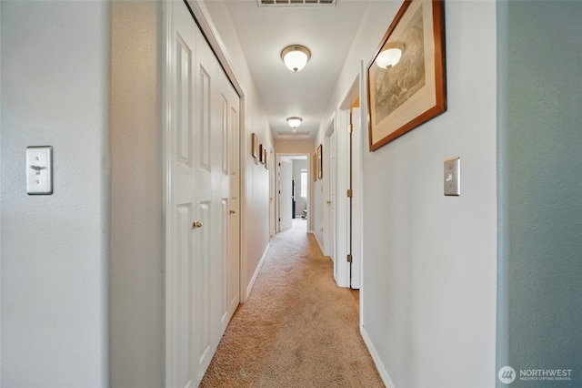 252 NW Ruby Ln, College Place, WA 99324 - hallway featuring light carpet