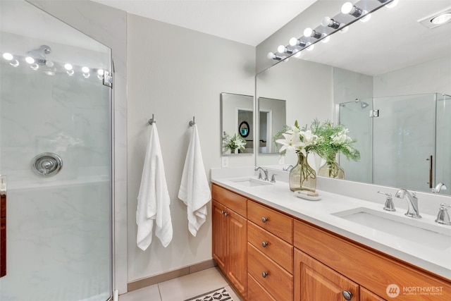 9009 Avondale Rd NE Unit D107, Redmond, WA 98052 - full bathroom with double vanity, a stall shower, and tile patterned floors