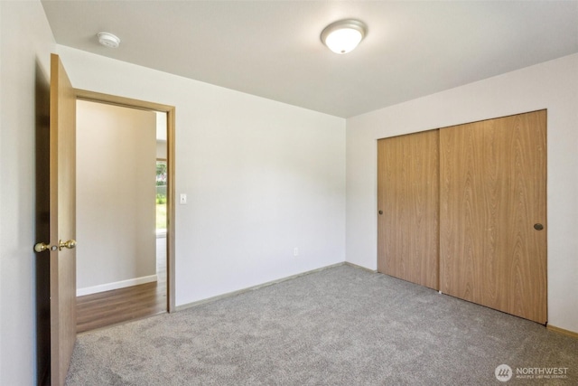 324 E 48th Street Dr, Tacoma, WA 98404 - unfurnished bedroom featuring carpet, a closet, and baseboards