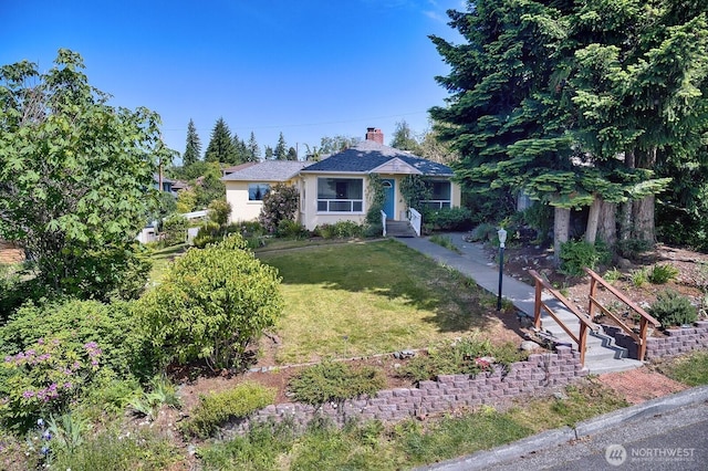 1160 St Paul St, Bellingham, WA 98229 - view of front of home with a front yard and a chimney