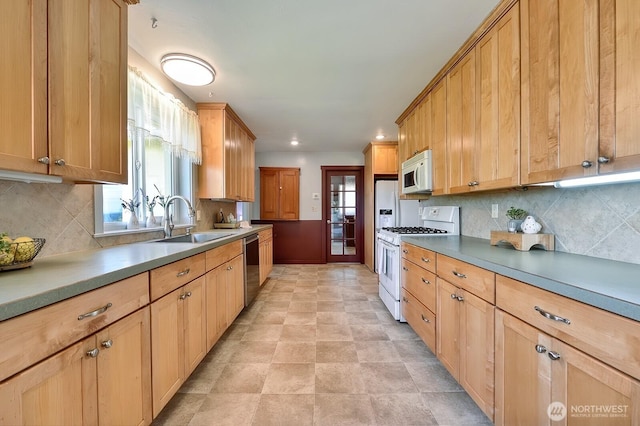 1160 St Paul St, Bellingham, WA 98229 - kitchen featuring white appliances, a sink, backsplash, recessed lighting, and baseboards