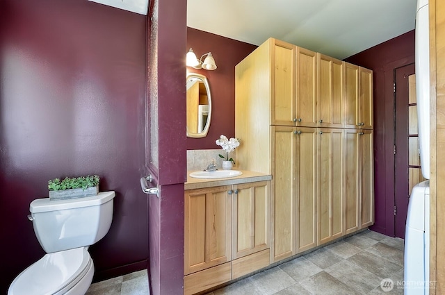 1160 St Paul St, Bellingham, WA 98229 - bathroom with toilet, washer / dryer, and vanity