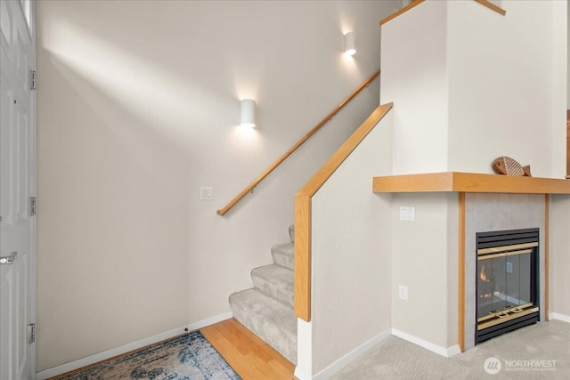 9008 NE 54th St Unit A3, Vancouver, WA 98662 - stairs with a fireplace and baseboards