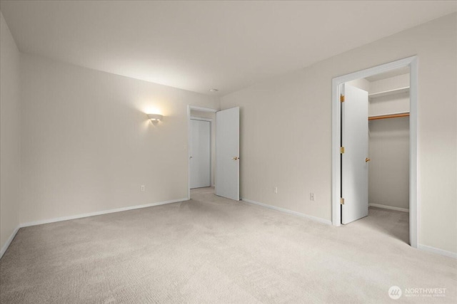 9008 NE 54th St Unit A3, Vancouver, WA 98662 - unfurnished bedroom with carpet flooring, a walk in closet, and a closet