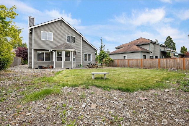 972 Rose Pl, Buckley, WA 98321 - rear view of house with a chimney