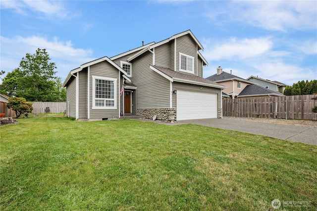 972 Rose Pl, Buckley, WA 98321 - view of front of home featuring asphalt driveway, an attached garage, and stone siding