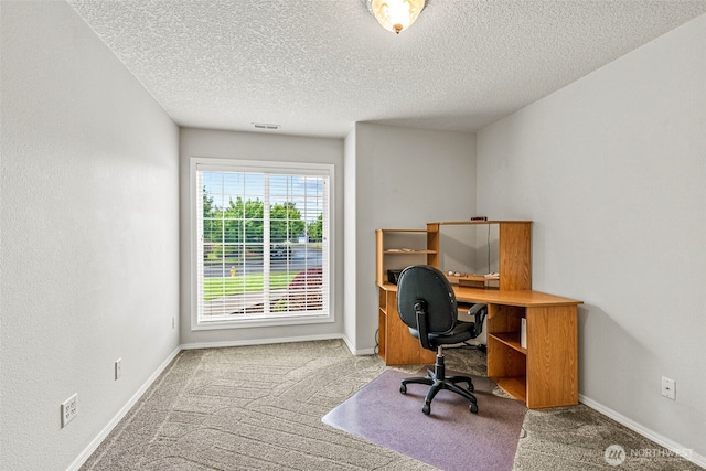 2321 52nd Ave, Longview, WA 98632 - carpeted home office featuring a textured ceiling and baseboards
