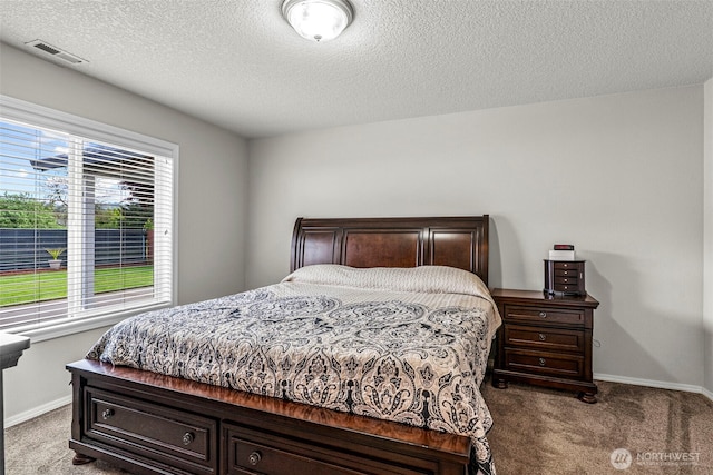 2321 52nd Ave, Longview, WA 98632 - bedroom featuring carpet, a textured ceiling, and baseboards