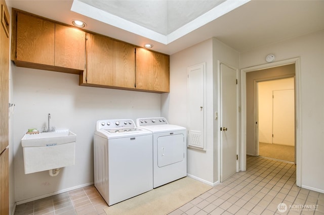 809 N K St, Aberdeen, WA 98520 - laundry room with cabinet space, washer and dryer, baseboards, light tile patterned flooring, and recessed lighting