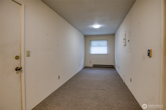 809 N K St, Aberdeen, WA 98520 - corridor featuring a baseboard radiator and carpet flooring