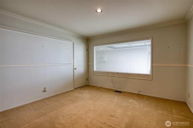 809 N K St, Aberdeen, WA 98520 - unfurnished room featuring ornamental molding, light colored carpet, baseboards, and recessed lighting