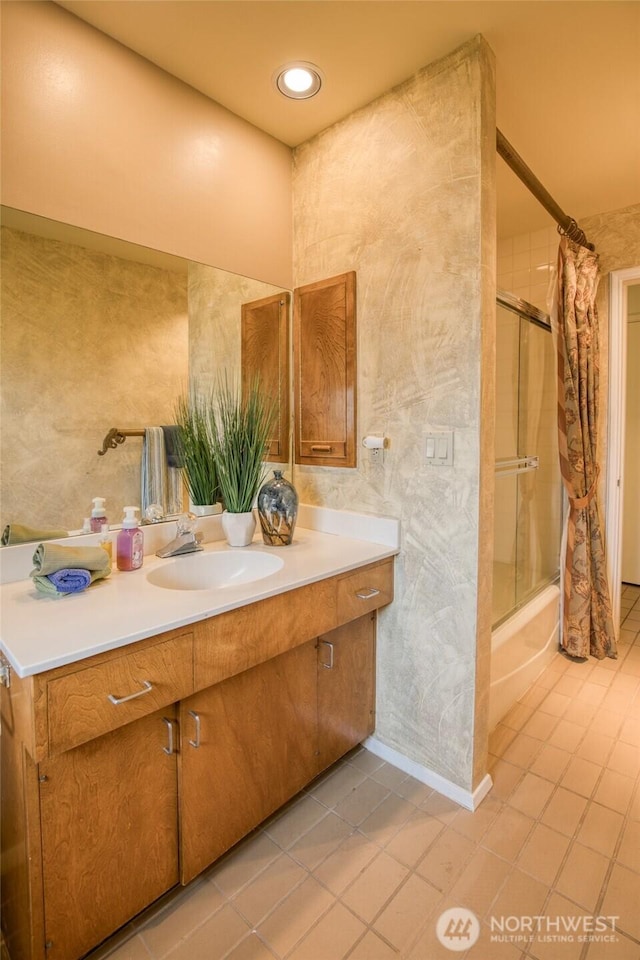 809 N K St, Aberdeen, WA 98520 - bathroom featuring vanity, tile patterned floors, shower / bath combo, baseboards, and recessed lighting