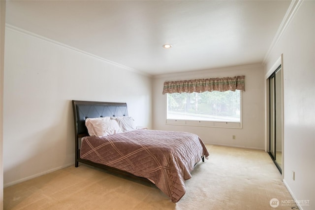 809 N K St, Aberdeen, WA 98520 - bedroom with crown molding, light colored carpet, baseboards, and a closet