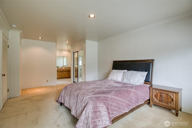 809 N K St, Aberdeen, WA 98520 - carpeted bedroom with ornamental molding, recessed lighting, and connected bathroom